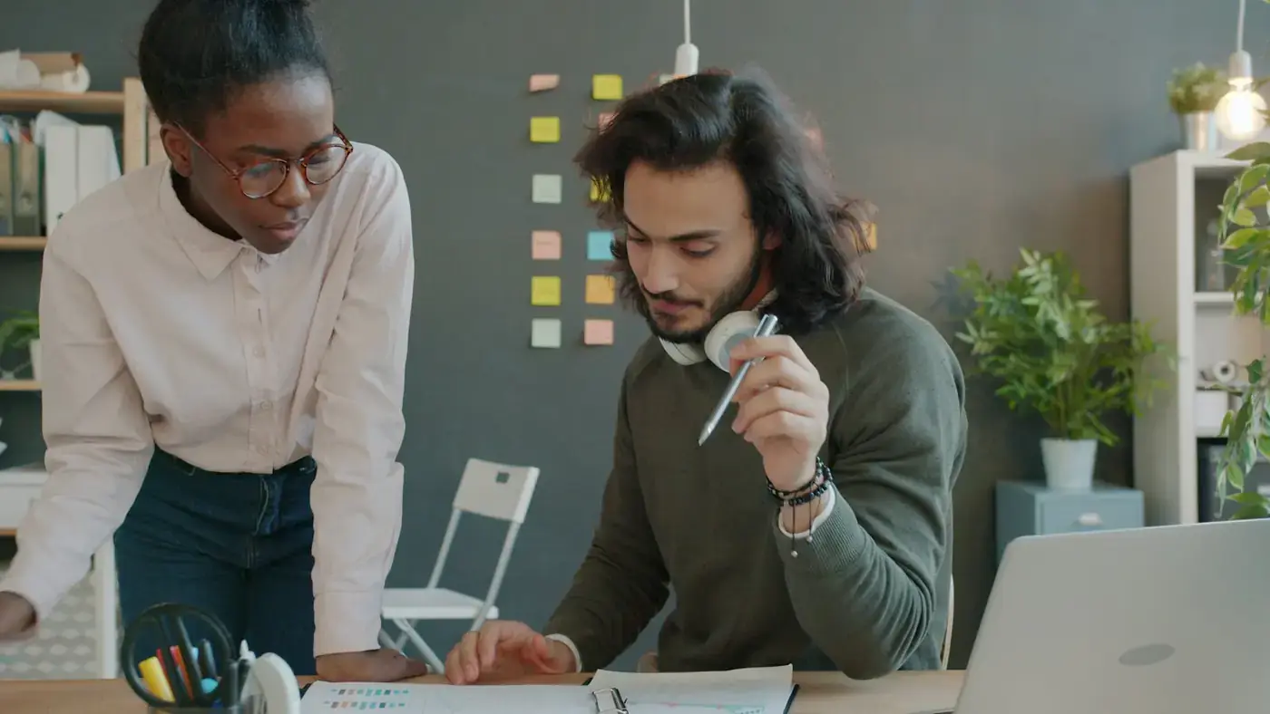 Colleagues reviewing documents