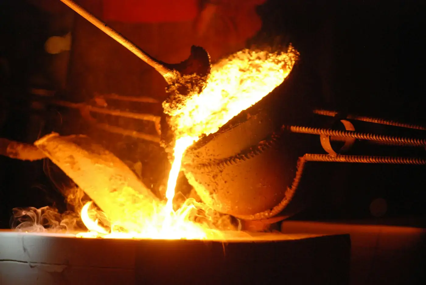 Molten metal poured from a ladle